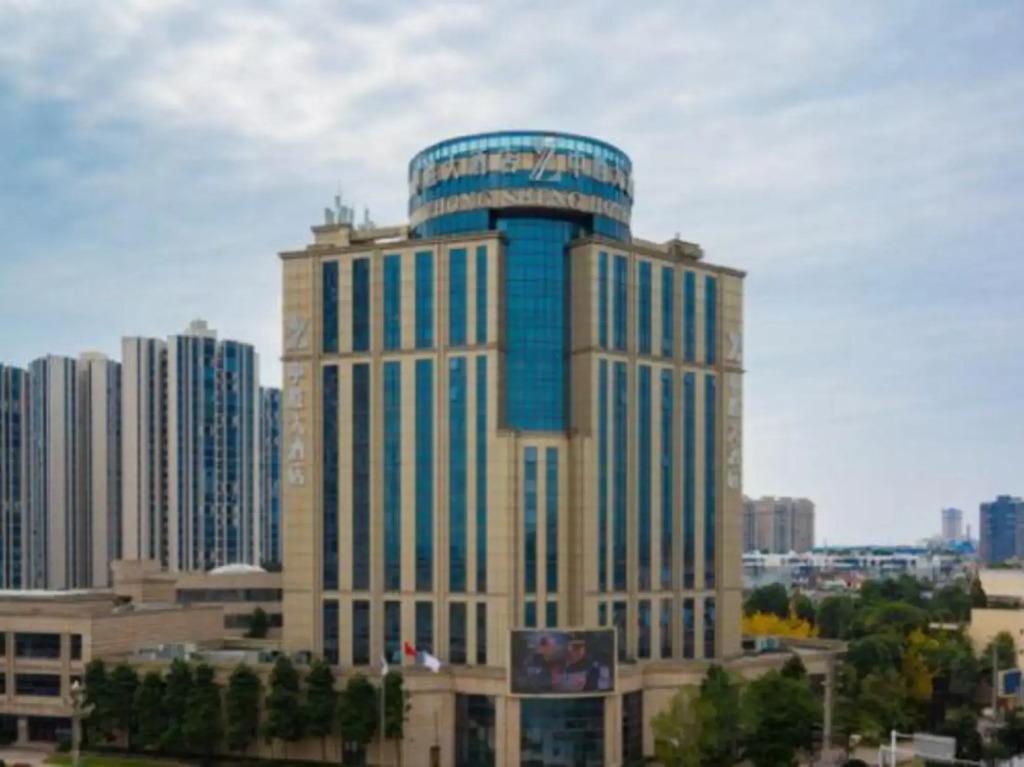 Zhongsheng Hotel - главное фото