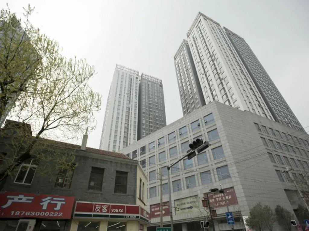 Qingdao May Flower Apartment - главное фото