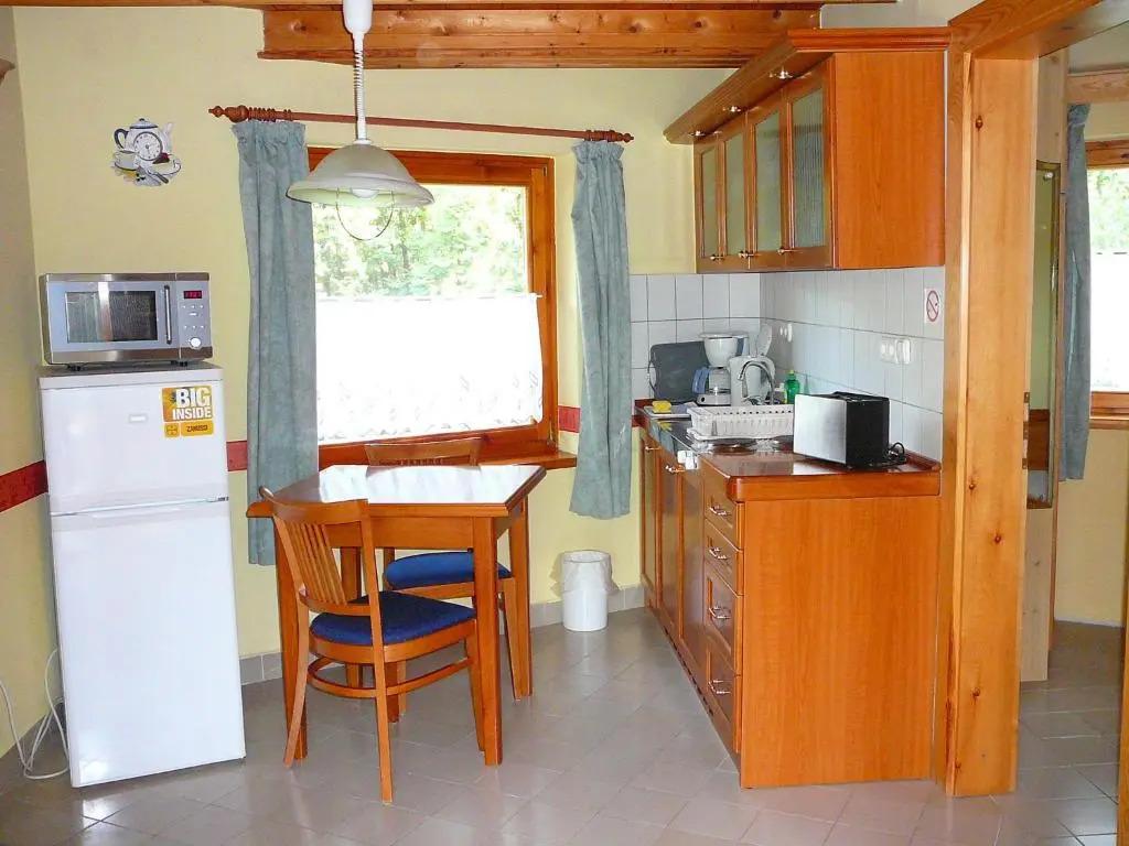 Zöld sziget Apartmanház - главное фото