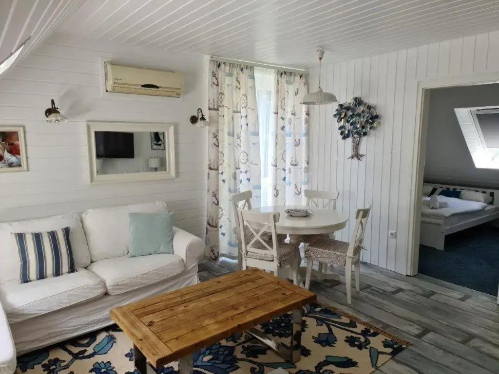 Rév Apartman - главное фото