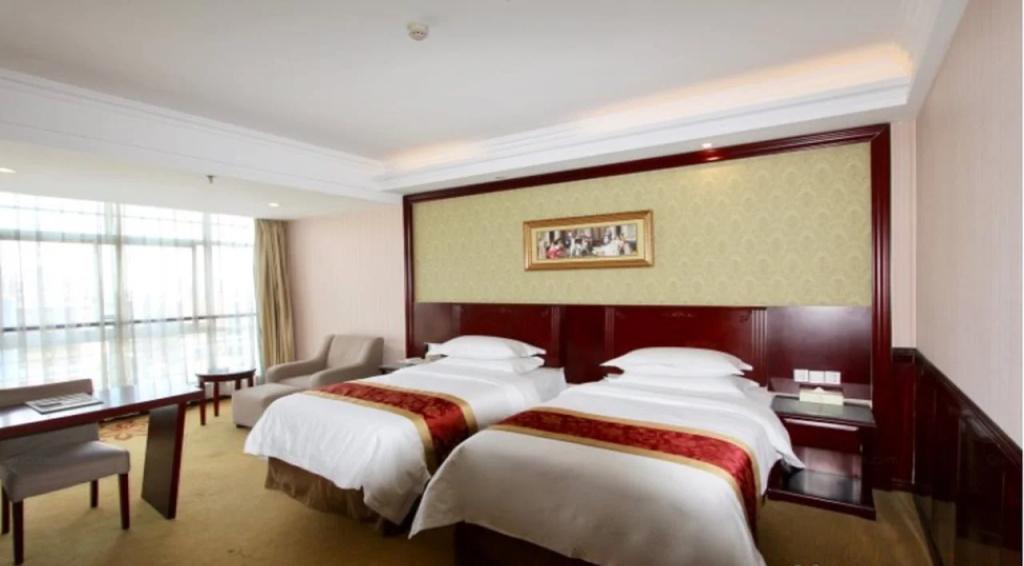 Vienna Hotel Zhejiang Haining Yancang Branch - главное фото