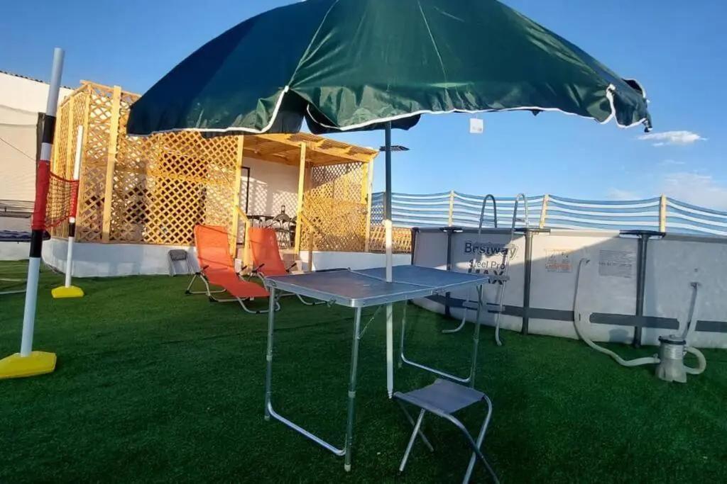 Cabaña con piscina, vista al Oasís de Pica. - главное фото